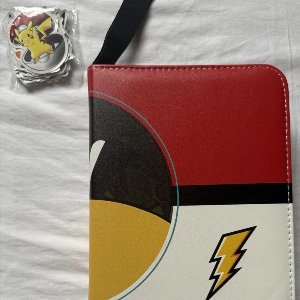 Red and Yellow Pikachu pokemon binder trading cards